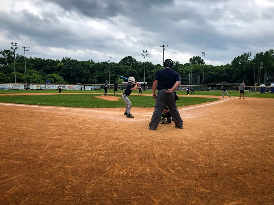 Starting a Travel Ball Baseball Team: A Step-by-Step Guide Youth travel baseball player waiting for pitch in batter box during tournament game