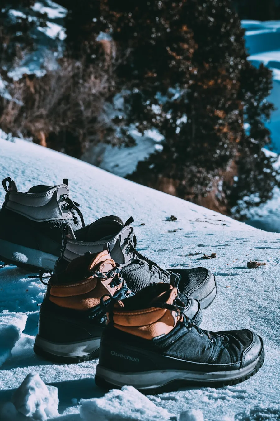 Are High Top Hiking Boots Better for Support and Stability? Hiker wearing high top hiking boots on a rugged trail