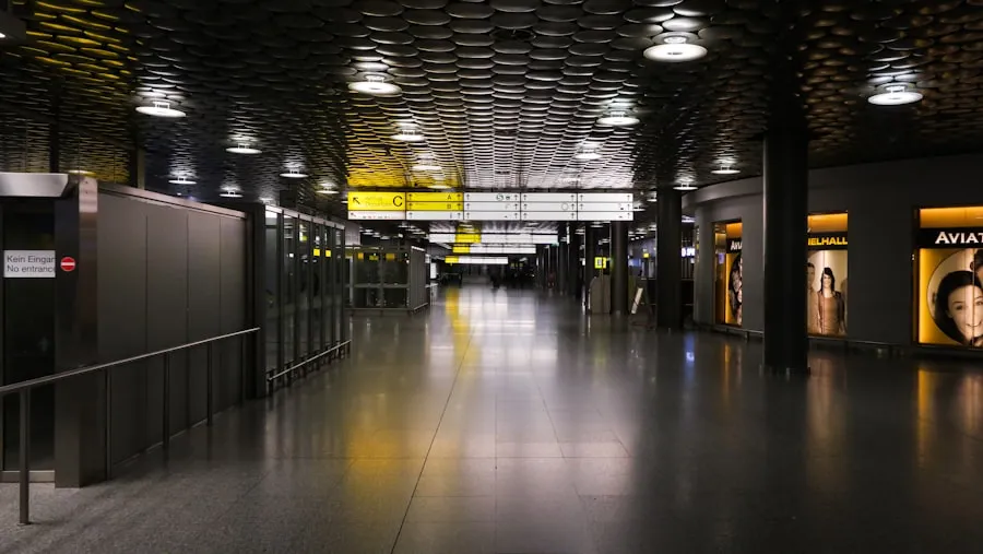 Travelers walking through the ticketing and concourse area of Phoenix Sky Harbor Terminal 3