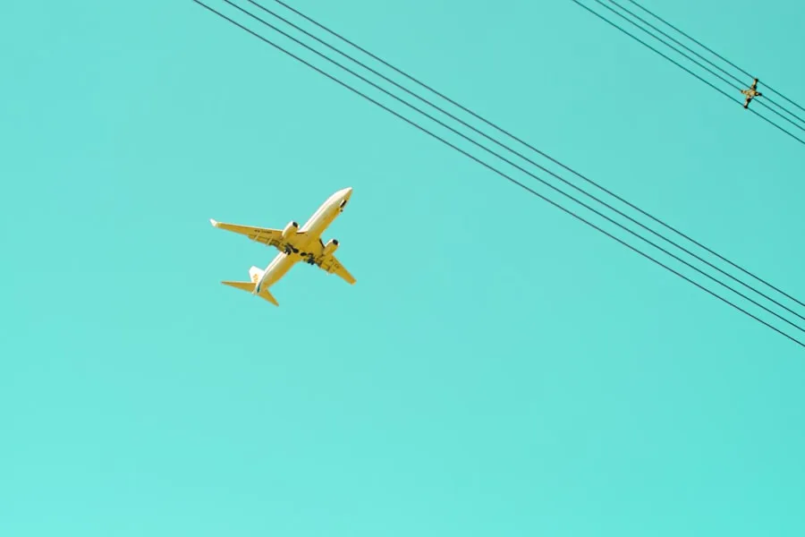 Passenger connecting a laptop to WiFi during a United Airlines flight