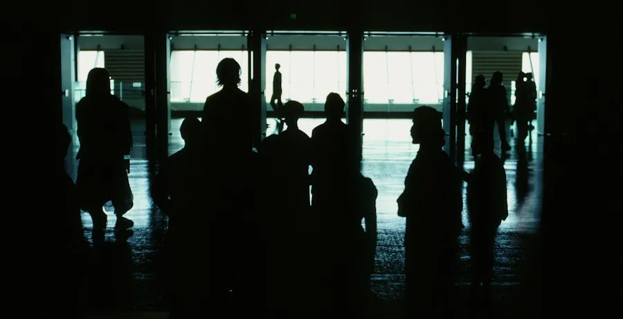 American Airlines: Streamlining Boarding with 9 Groups Silhouettes of airline passengers waiting inside an airport terminal