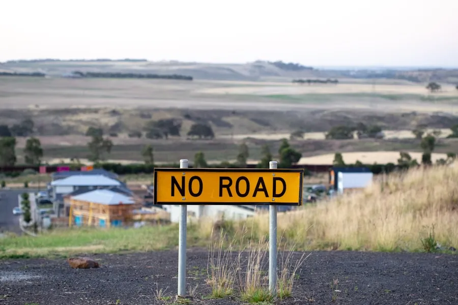 Discover Contour Airlines' Destinations Yellow No Road sign overlooking a rural landscape