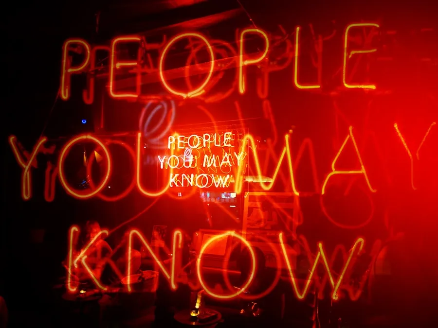 Radisson Hotels: Owned by Jin Jiang International Red neon sign reading People You May Know