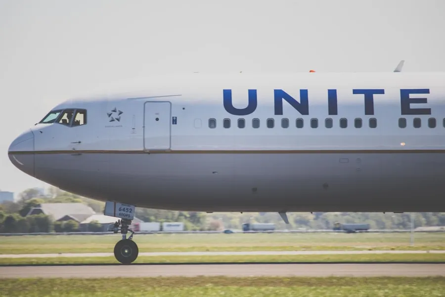 Traveler using a United Airlines Premier Access check-in counter