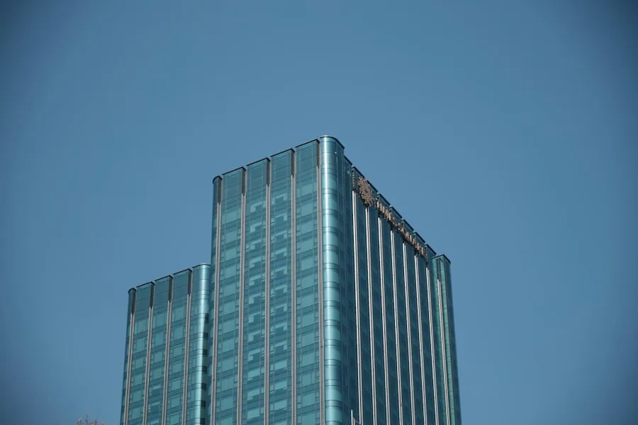 Superstition: Why Hotels Skip the 13th Floor Glass high-rise hotel building against a blue sky