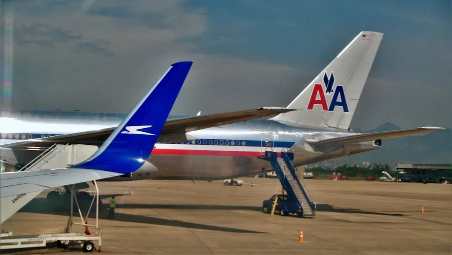 American Airlines Terminal at MCO: A Guide Traveler checking American Airlines flight information at Orlando International Airport