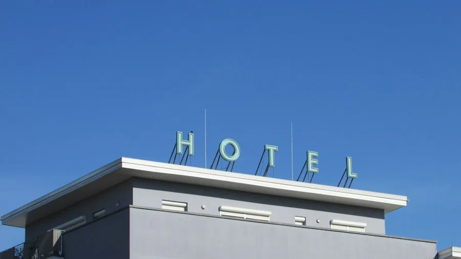 Traveler reviewing extended stay hotel deals on a laptop