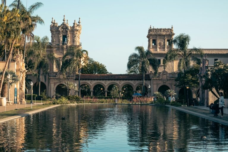 Lily pond and historic buildings in Balboa Park, San Diego