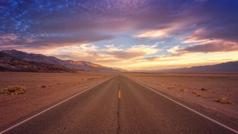California Itinerary 14 Days Straight desert highway in Death Valley at sunset, California