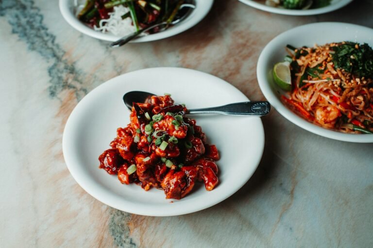 Best Restaurants in Los Angeles, California: Where to Eat Now Plated restaurant dishes on a marble table