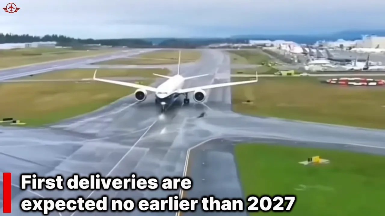 Boeing 777-9 flying over a wet runway during its certification program