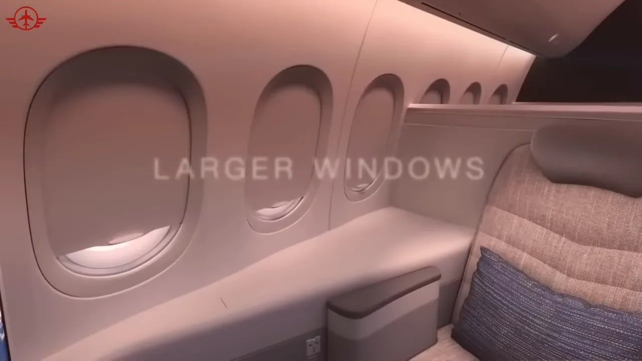 Row of large Boeing 777X windows positioned high along a premium cabin wall
