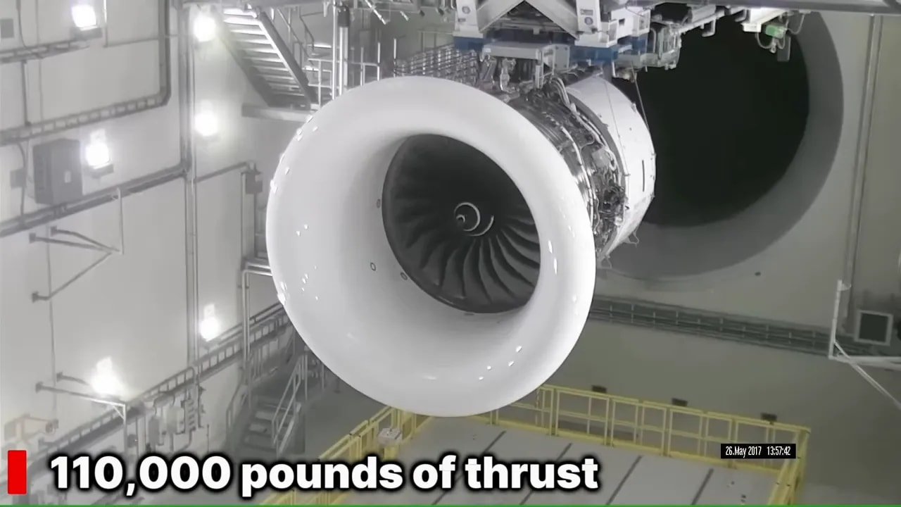 GE9X engine in a ground-test facility with an on-screen thrust graphic